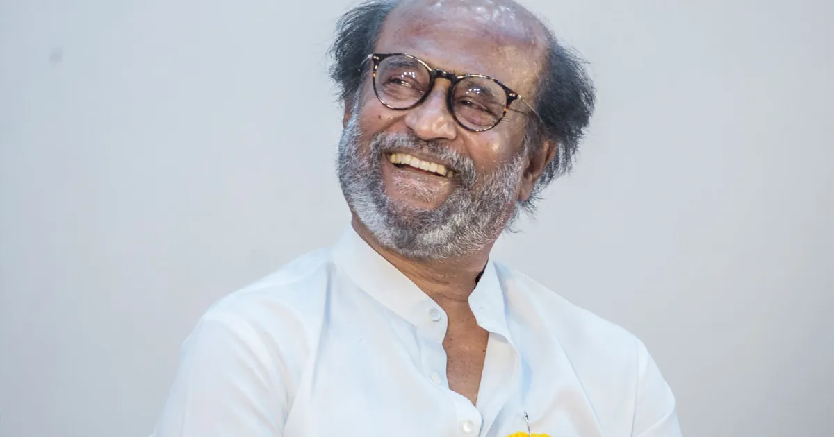 Rajinikanth at a public event in Chennai, wearing glasses and a white shirt
