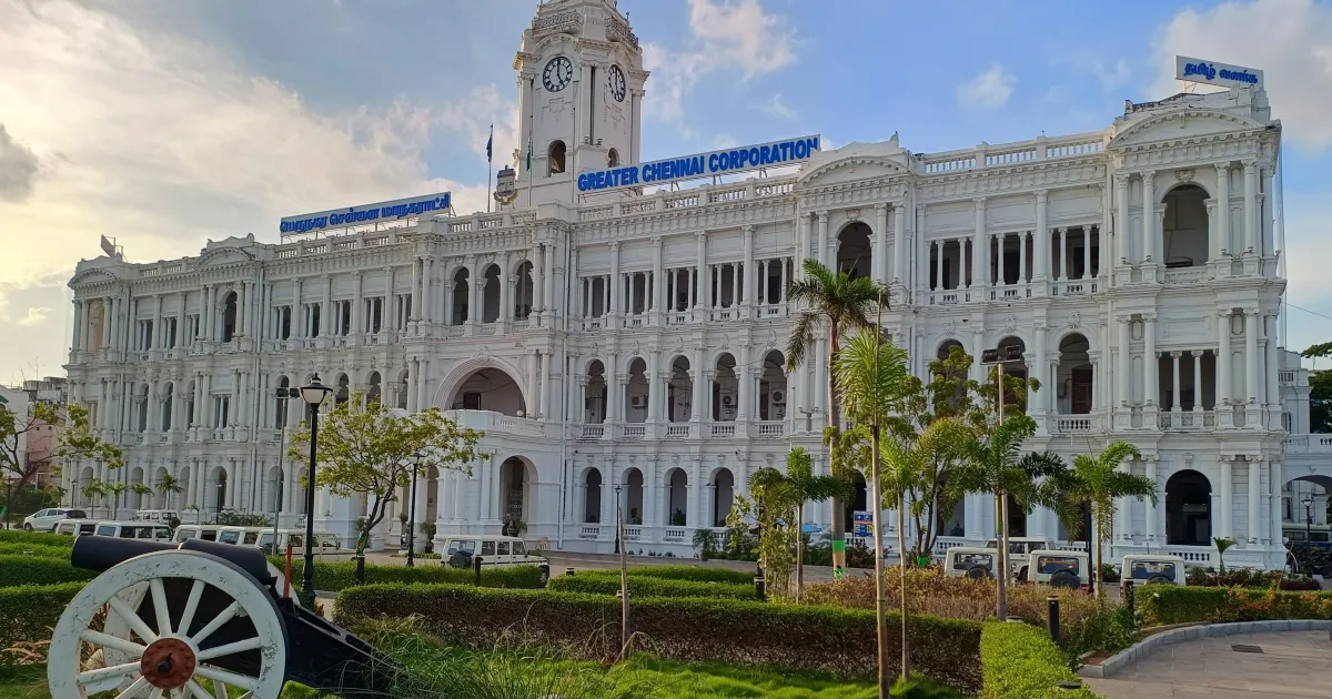 Ripon Building in Chennai, the white headquarters of the Greater Chennai Corporation, with its clock tower and a cannon on the lawn