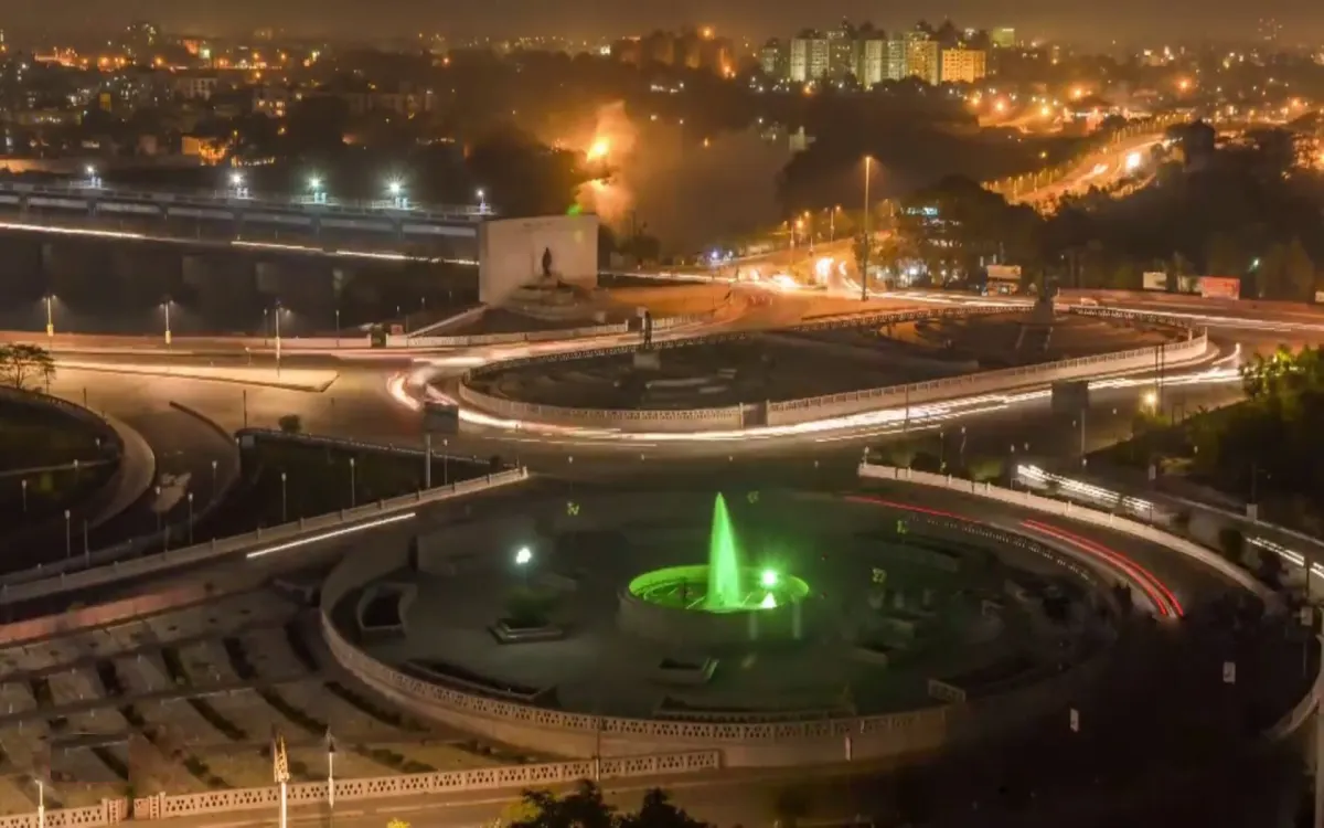 Lucknow city skyline seen from Gomti Nagar with tall buildings and trees